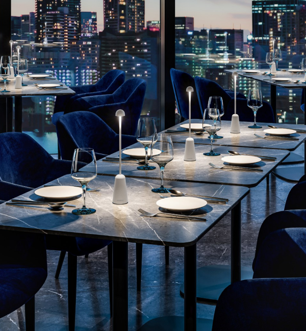 standing lamp beside single gray chair