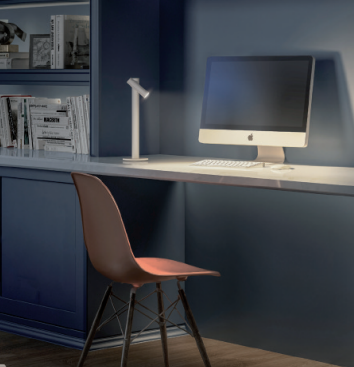 standing lamp beside single gray chair